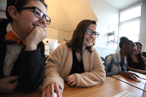 photo of students working on computers