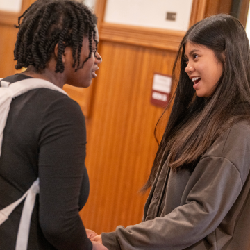 2 Woodward students meeting in the hall