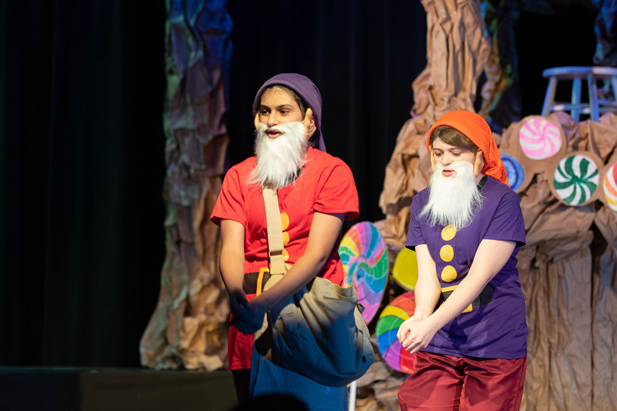 Woodward student performing as elves or gnomes