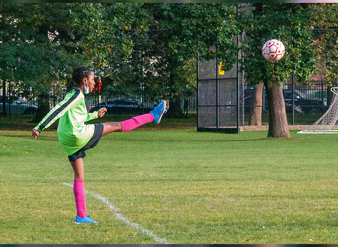 Woodward soccer player kicks ball in from outside