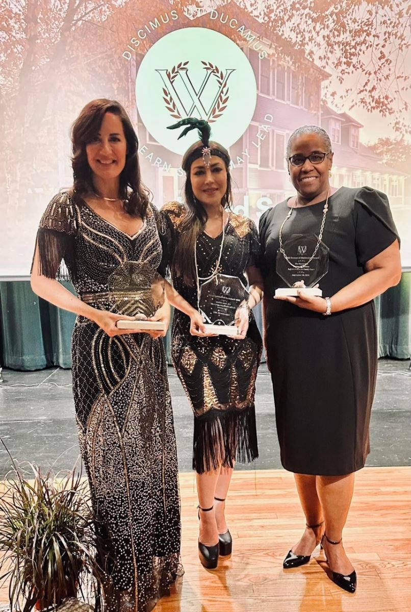 Jen Maseda, Saima Shahnawaz Durrani, and Janine Rivers holding Women of Distinction Awards at the Anuual Woodward Gala