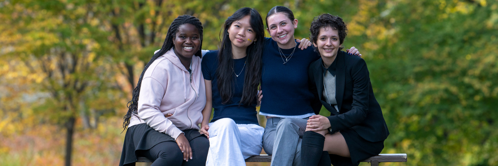 Woodward students on an outside bench on campus