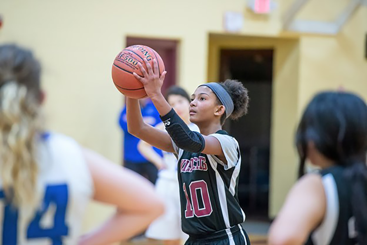 Woodward Student Participating in a Basketball Game