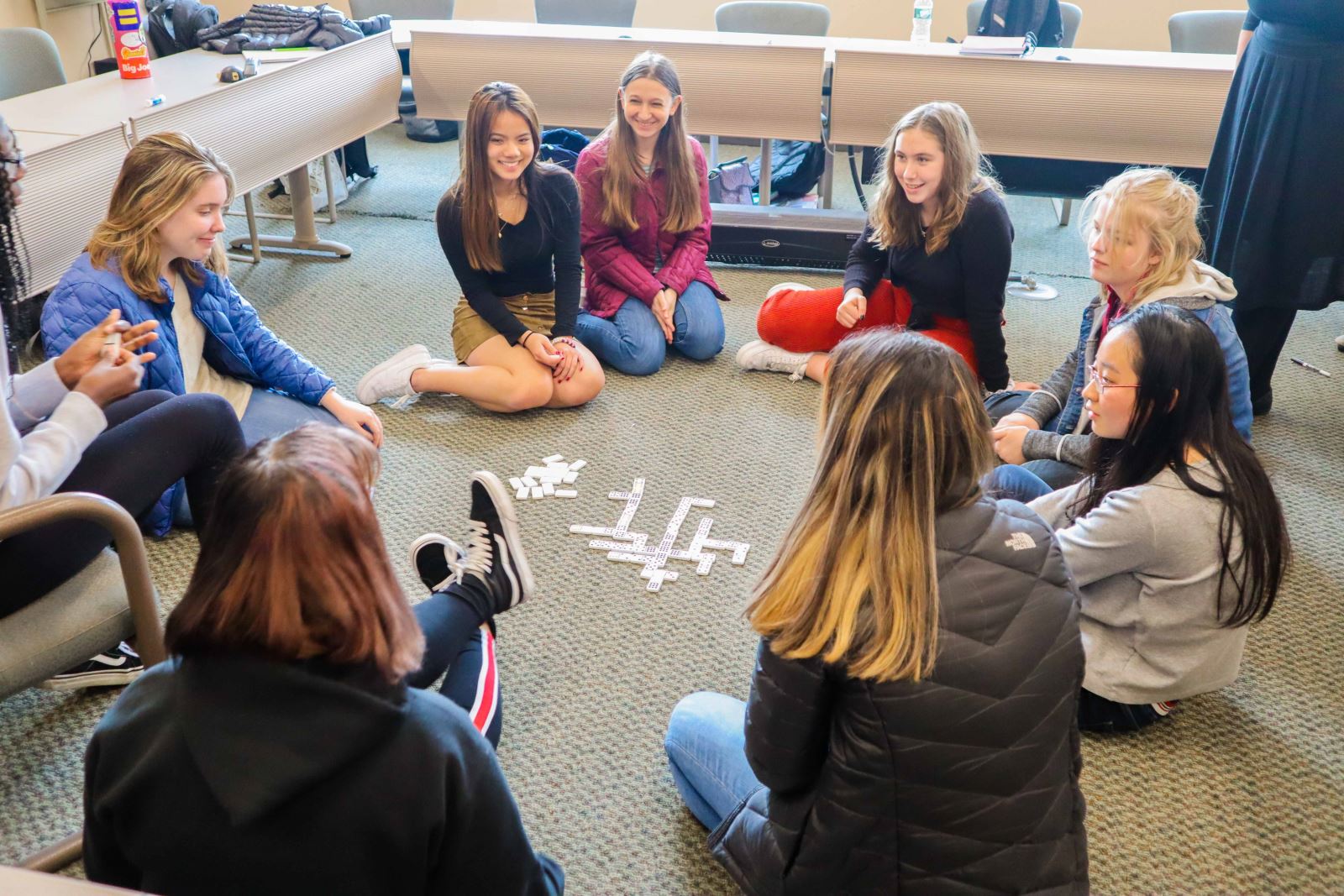 photo of Woodward students playing dominoes during a club activity