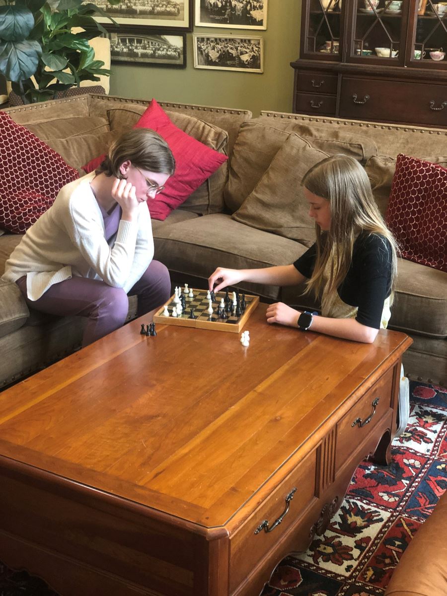 photo of 2 Woodward students playing chess in a club activity