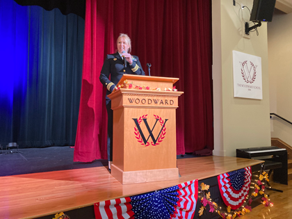 Speaker standing at podium