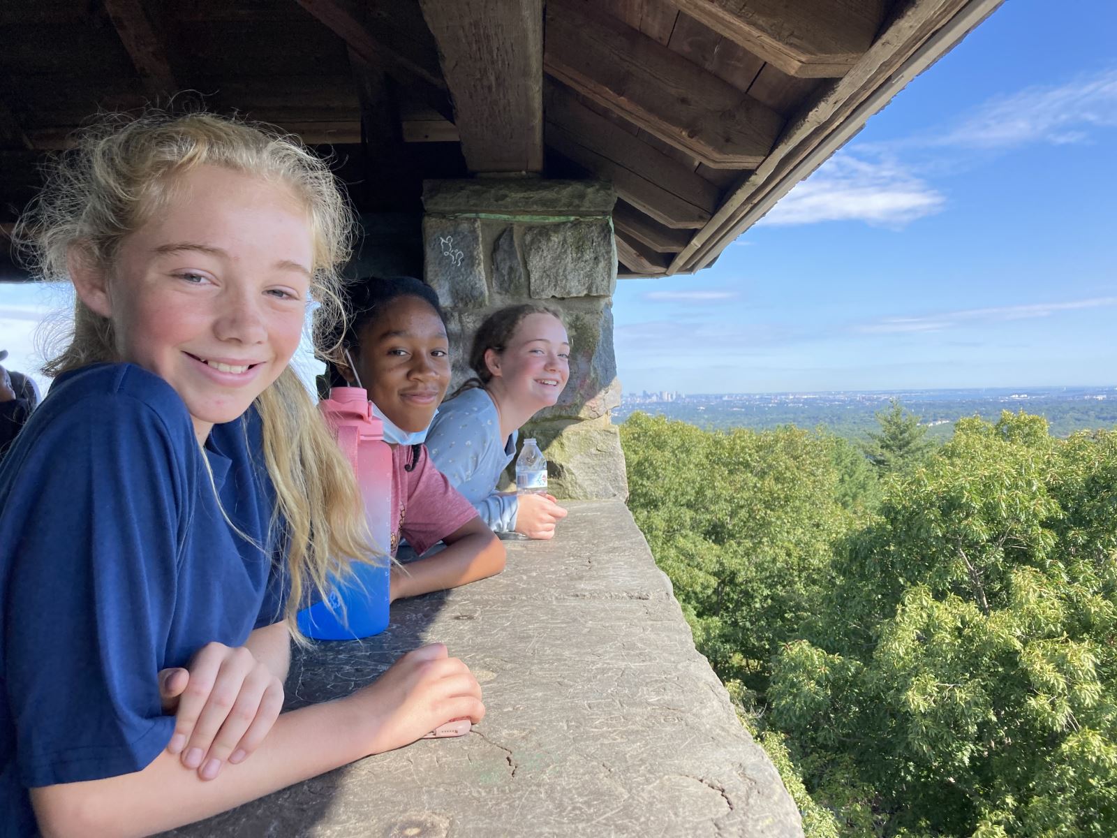 Girls looking out at Blue Hills