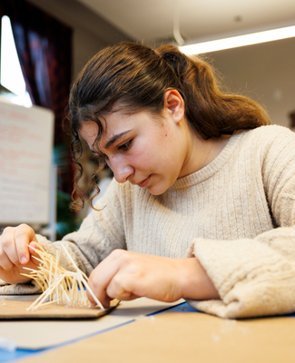 A Woodward Student working on an engineering project